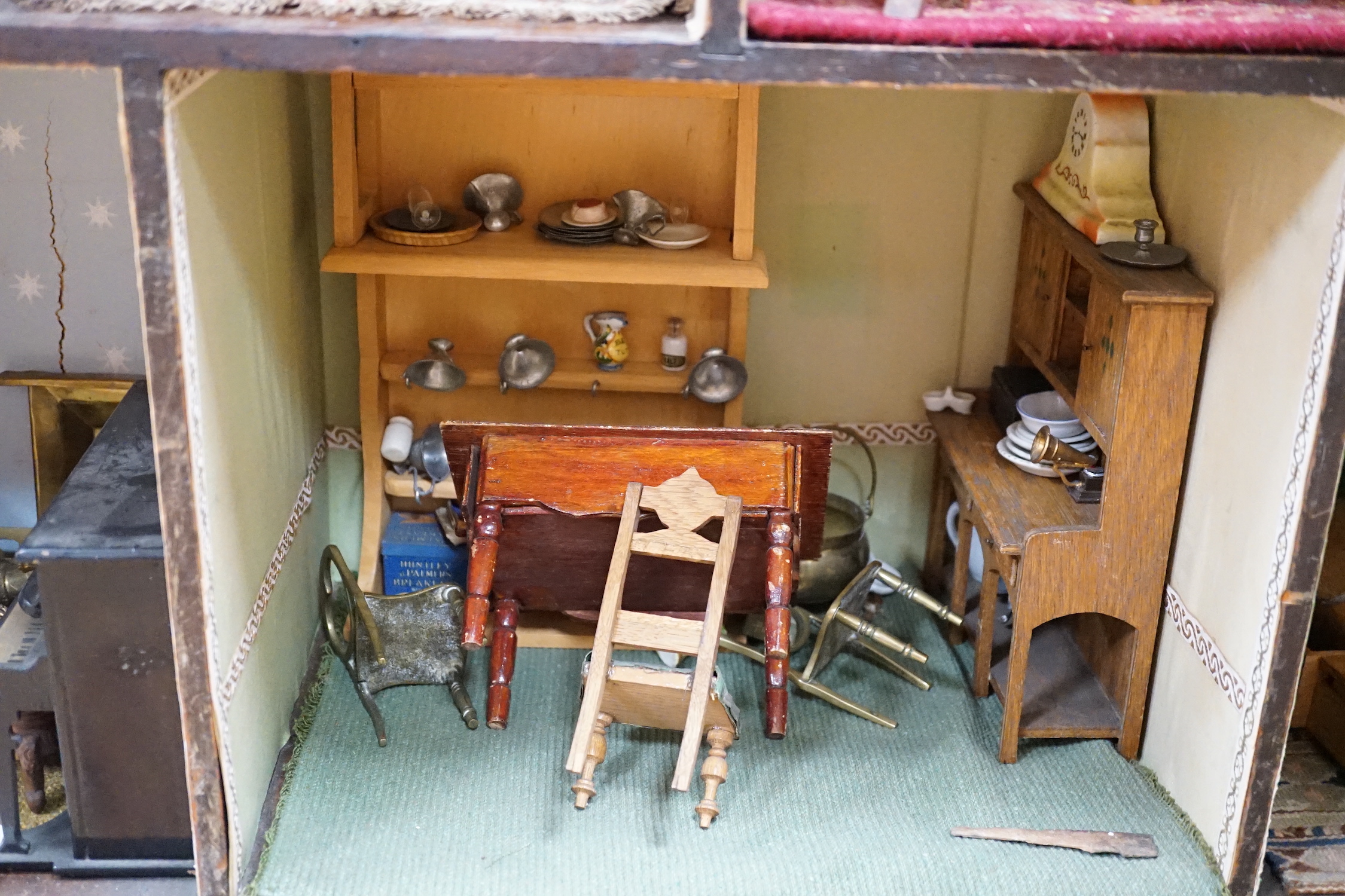 A furnished English dolls’ house, circa 1810-20, 104cm high